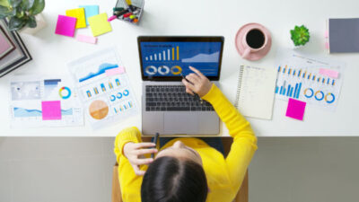 woman conducting research for seo keyword strategy