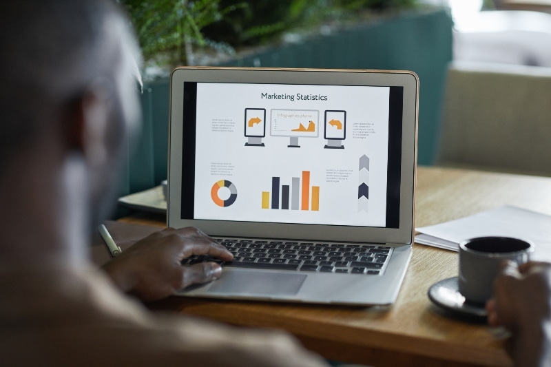 businessman-analyzing-marketing-statistics-2023-11-27-04-55-38-utc-1 Maximizing Marketing ROI with Call Tracking