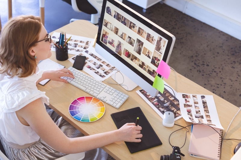 female-graphic-designer-working-on-graphic-tablet-2023-11-27-05-28-19-utc-1 Landing Page Design – What You Need to Know