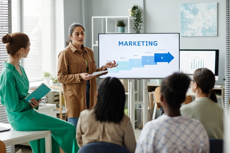 woman-presenting-marketing-strategy-to-colleagues-2023-11-27-04-58-44-utc-1 The Art of Nurturing Leads into Successful Sales
