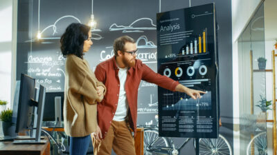 marketing team showing results from lead generation content marketing strategy
